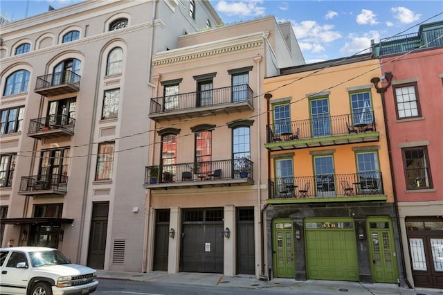 416 Common St Unit 6, New Orleans, LA 70130 - view of building exterior featuring a garage