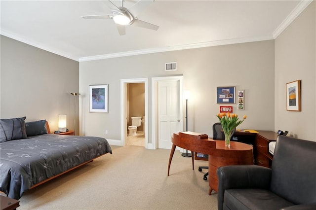 carpeted bedroom featuring ceiling fan, ensuite bathroom, and ornamental molding