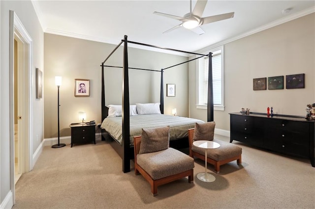 bedroom featuring ornamental molding, light carpet, and ceiling fan