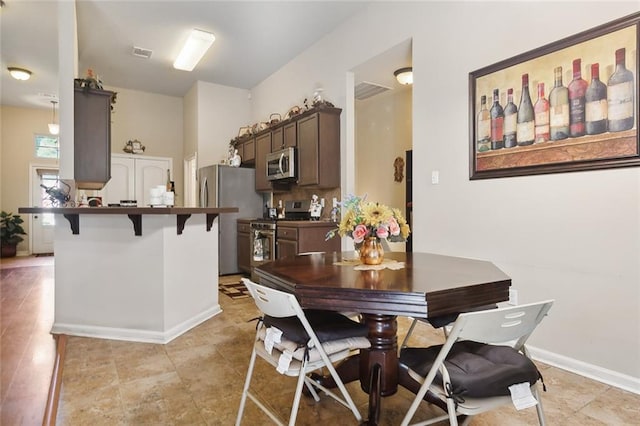 dining room featuring light wood-type flooring