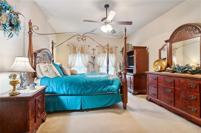 bedroom featuring ceiling fan and light colored carpet