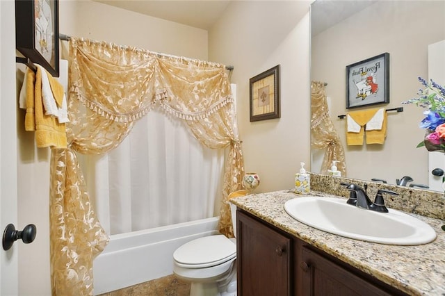 full bathroom featuring shower / bathtub combination with curtain, vanity, and toilet