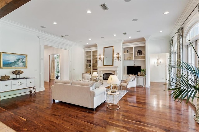 living room featuring dark hardwood / wood-style floors and crown molding