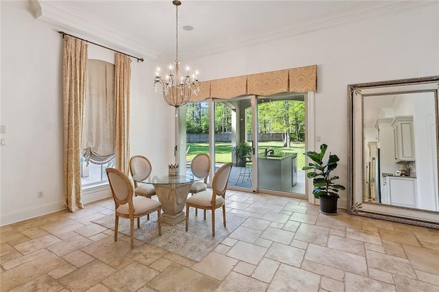 dining space featuring crown molding and a notable chandelier