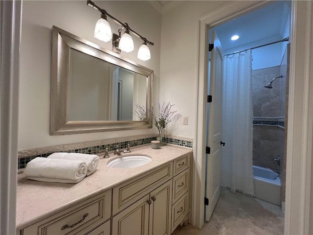 bathroom with ornamental molding, vanity, and shower / bath combination with curtain