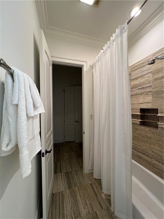 hallway featuring crown molding and dark wood-type flooring