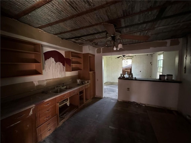 kitchen with ceiling fan and sink