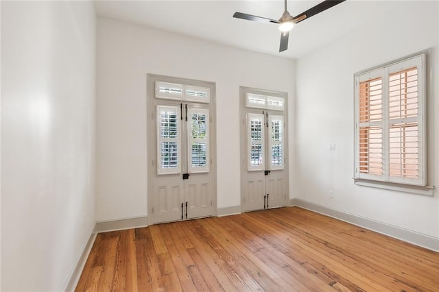 interior space featuring ceiling fan and light hardwood / wood-style flooring