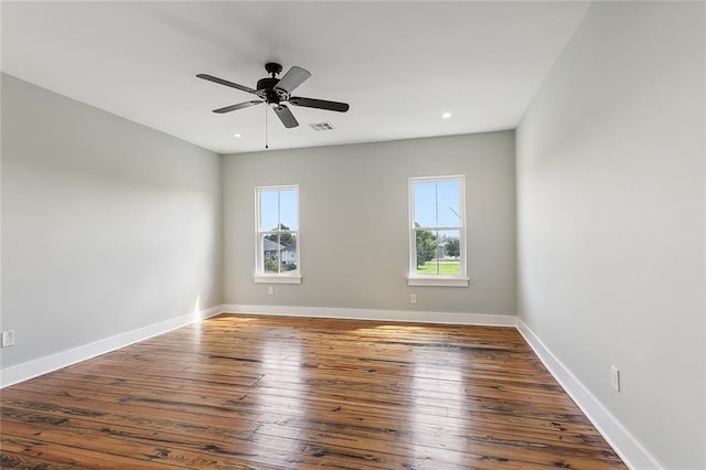 unfurnished room featuring hardwood / wood-style flooring and ceiling fan