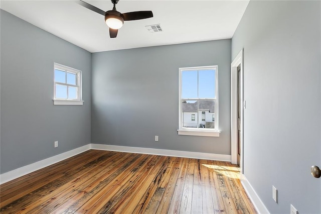 unfurnished room featuring ceiling fan and wood-type flooring