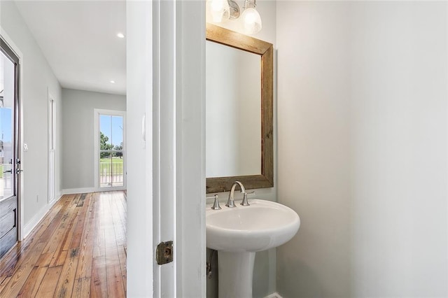 bathroom featuring hardwood / wood-style flooring