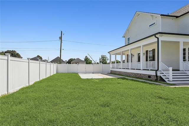 view of yard with a porch