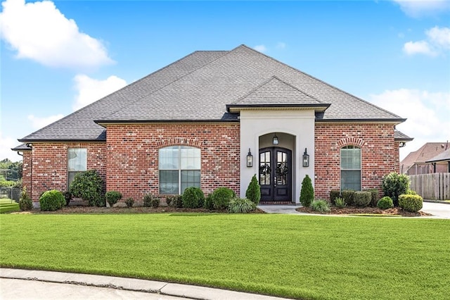 front facade with a front yard