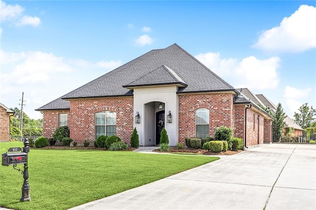 view of front of home with a front yard