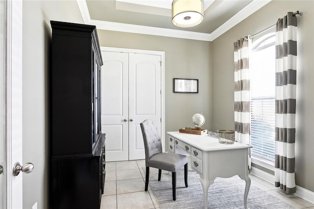 tiled office space featuring ornamental molding and a healthy amount of sunlight