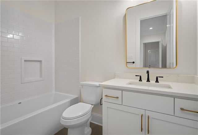 full bathroom featuring toilet, shower / bathing tub combination, and vanity