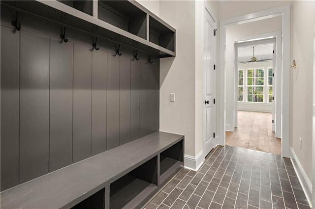 mudroom featuring ceiling fan