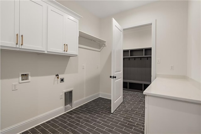 washroom featuring cabinets and hookup for an electric dryer