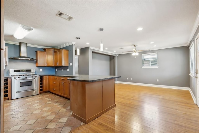 spare room with light hardwood / wood-style flooring and ceiling fan