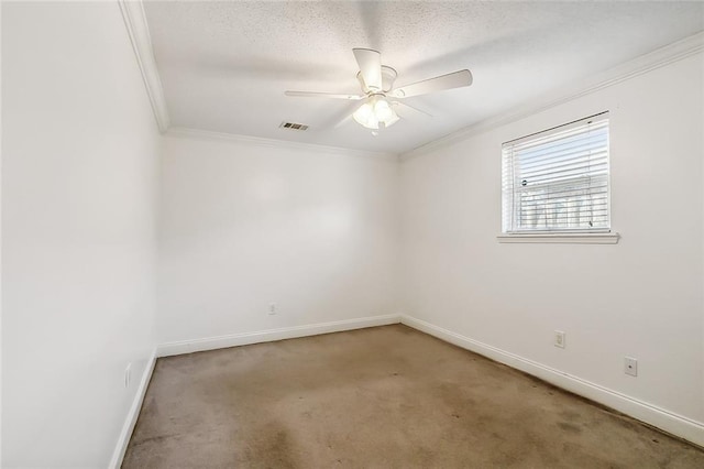 empty room with ceiling fan, crown molding, a textured ceiling, and light carpet