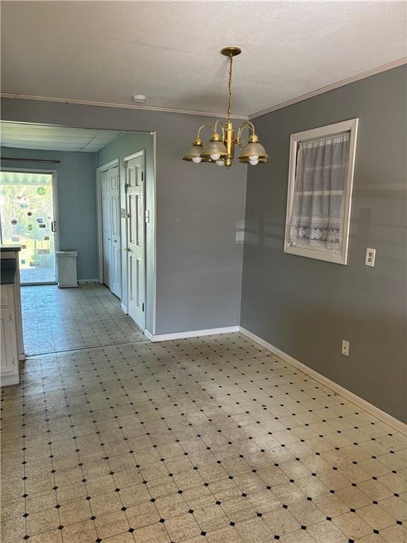 3008 Lake Villa Dr, Metairie, LA 70002 - empty room with tile patterned floors, baseboards, a chandelier, and crown molding