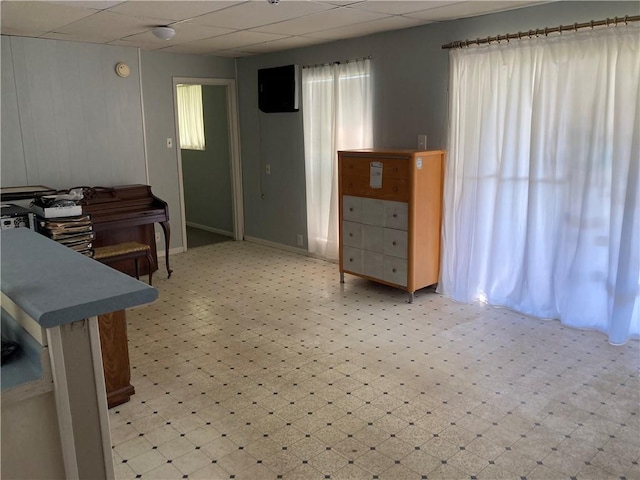 bedroom with a paneled ceiling