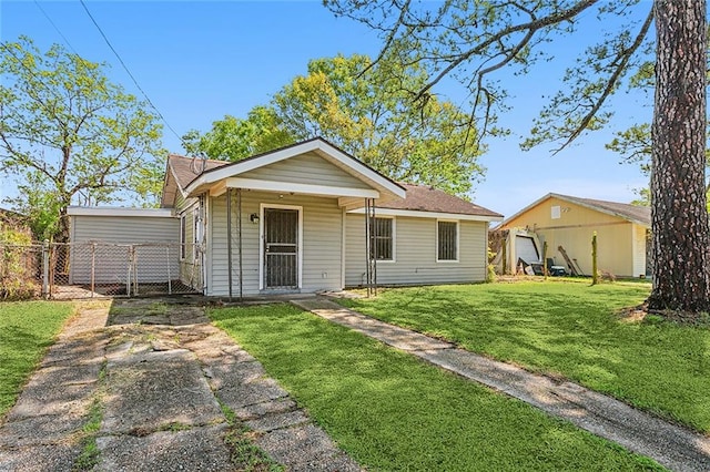 view of front of home with a front yard