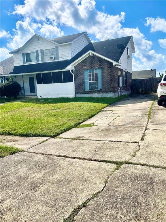 view of front of home with a front yard