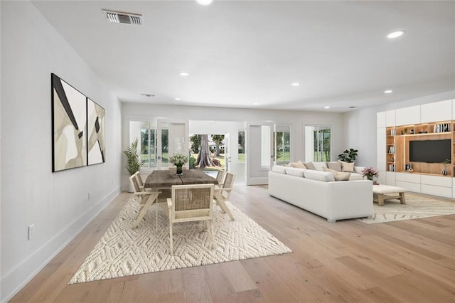 living room featuring light wood-type flooring