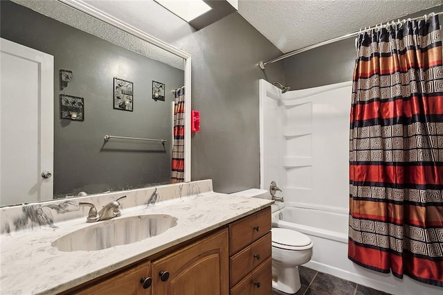 full bathroom featuring vanity, a textured ceiling, tile patterned flooring, shower / tub combo with curtain, and toilet