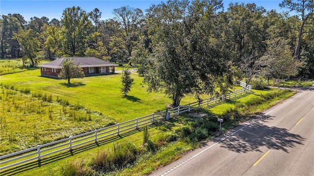 birds eye view of property featuring a rural view