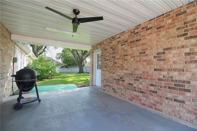 view of patio featuring ceiling fan and grilling area