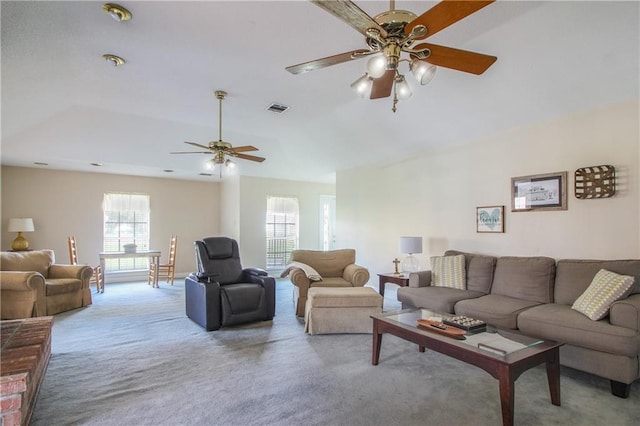 living room featuring ceiling fan and carpet flooring