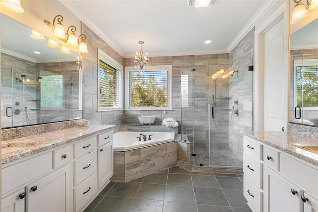 bathroom featuring vanity, independent shower and bath, a chandelier, tile walls, and crown molding