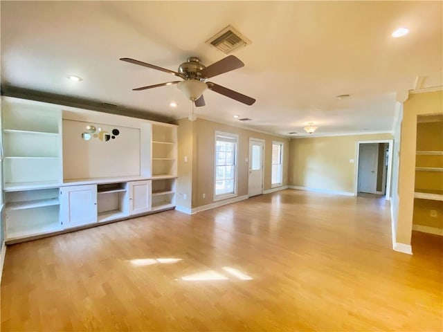 unfurnished living room featuring light hardwood / wood-style floors, ceiling fan, and crown molding