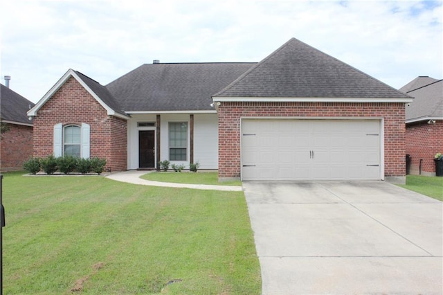 ranch-style house with driveway, a shingled roof, an attached garage, a front yard, and brick siding