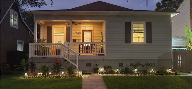 view of front facade with a porch and a ceiling fan