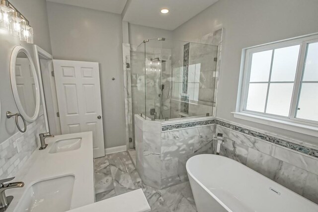 bathroom with vanity and plus walk in shower