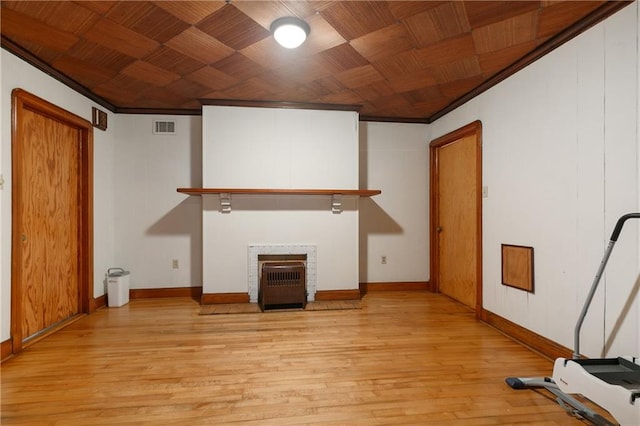 unfurnished living room featuring wood ceiling, light hardwood / wood-style floors, and crown molding