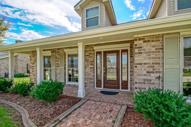 entrance to property with a porch