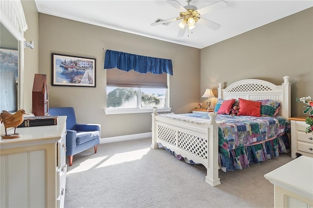 bedroom with light colored carpet and ceiling fan