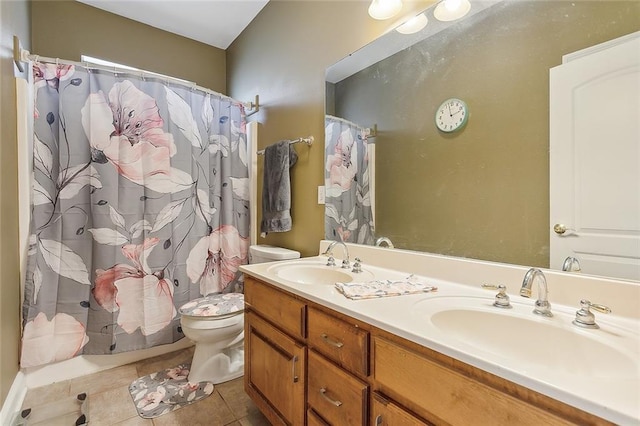 bathroom featuring tile patterned floors, a shower with curtain, vanity, and toilet