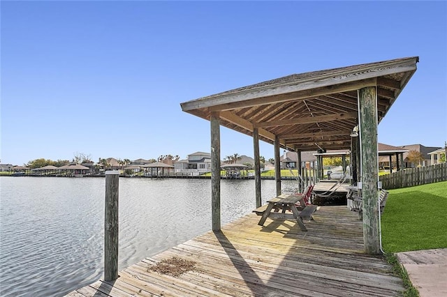 dock area featuring a water view