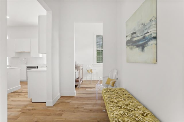 hallway featuring light hardwood / wood-style flooring