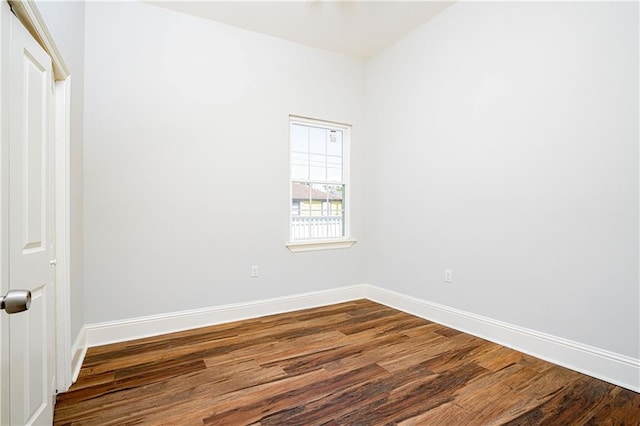 empty room with wood-type flooring