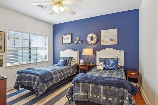 10 Catalpa Trce, Covington, LA 70433 - bedroom featuring baseboards and a ceiling fan