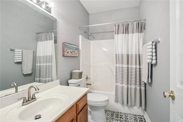 full bathroom featuring shower / bath combination with curtain, vanity, tile patterned flooring, and toilet