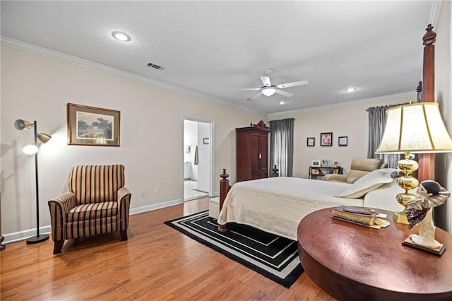 bedroom with wood-type flooring, ornamental molding, ensuite bathroom, and ceiling fan