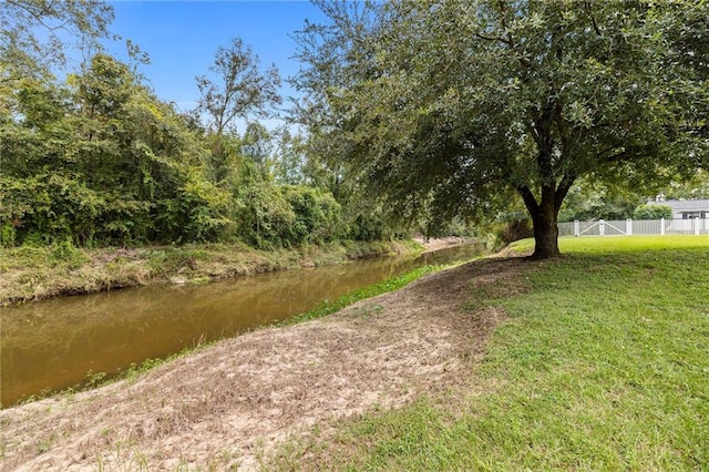 view of yard with a water view