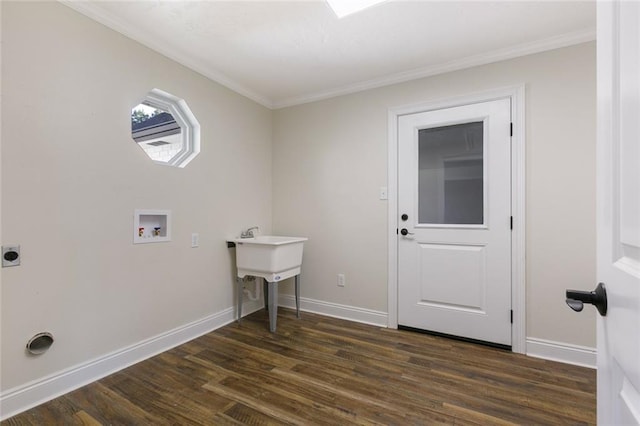 washroom featuring hookup for a washing machine, ornamental molding, electric dryer hookup, and dark wood-type flooring